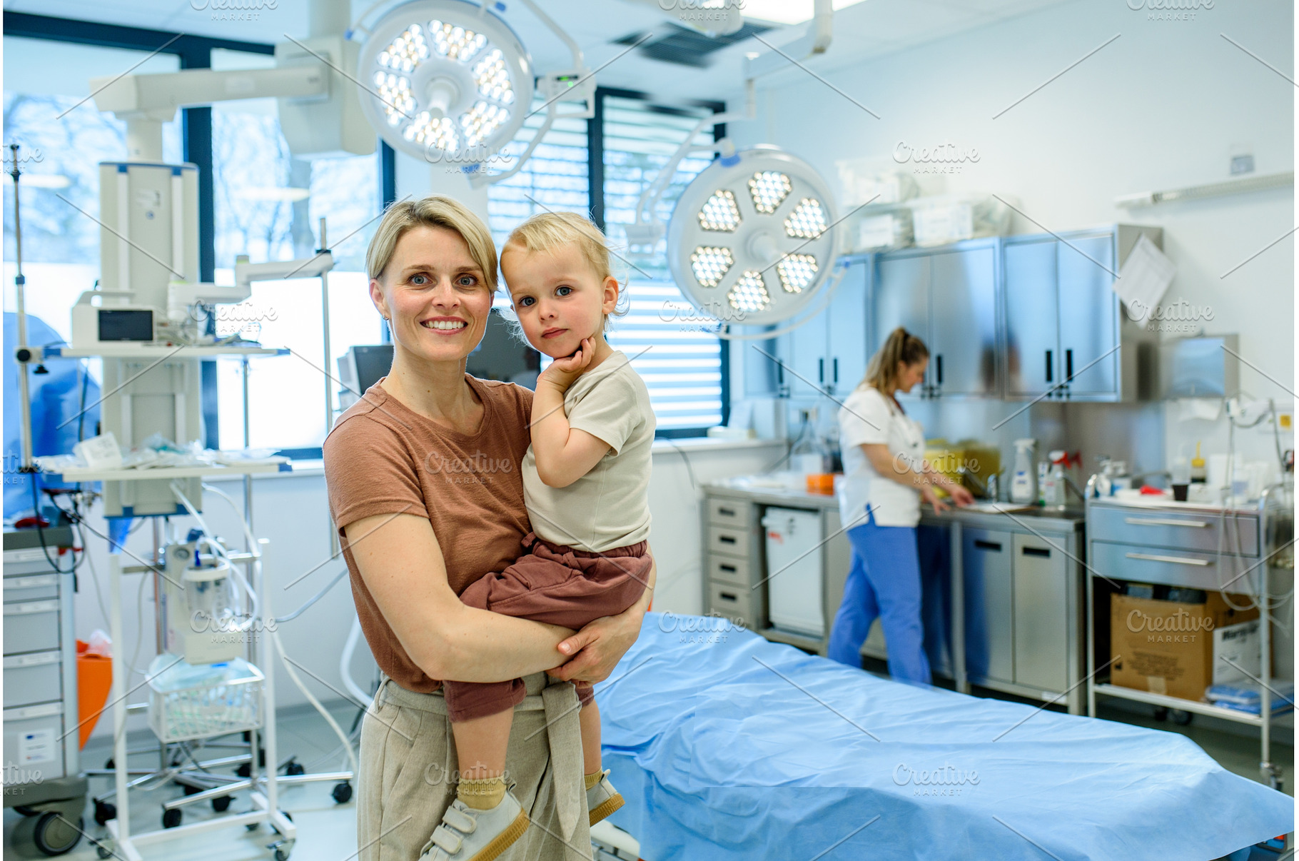 Portrait of beautiful mother with, a Health & Medical Photo by HalfPoint