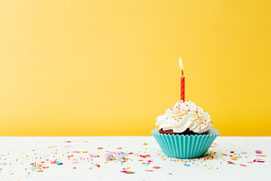 Birthday cupcake on yellow backgroun featuring birthday, cake, and cupcake