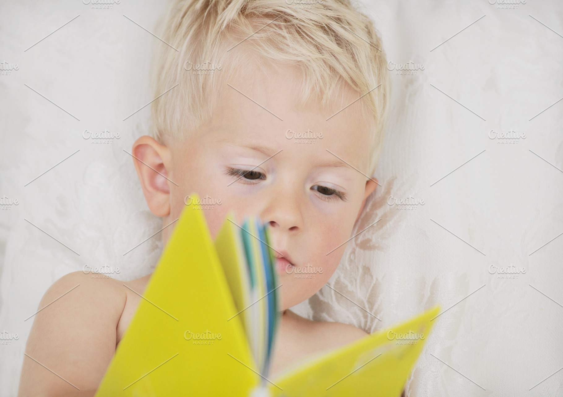 Boy reading book containing book, reading, and child reading, a Person Photo by Carolyn Sandstrom Art
