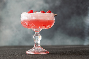 Elegant Clover Club cocktail with velvety foam fresh raspberries, a Food & Drink Photo by Alexander Prokopenko