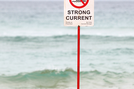 Danger Sign on the Beach