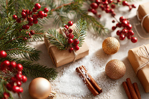 Festive holiday gifts with decorations on snow, a Holiday Photo by AlyaAnd