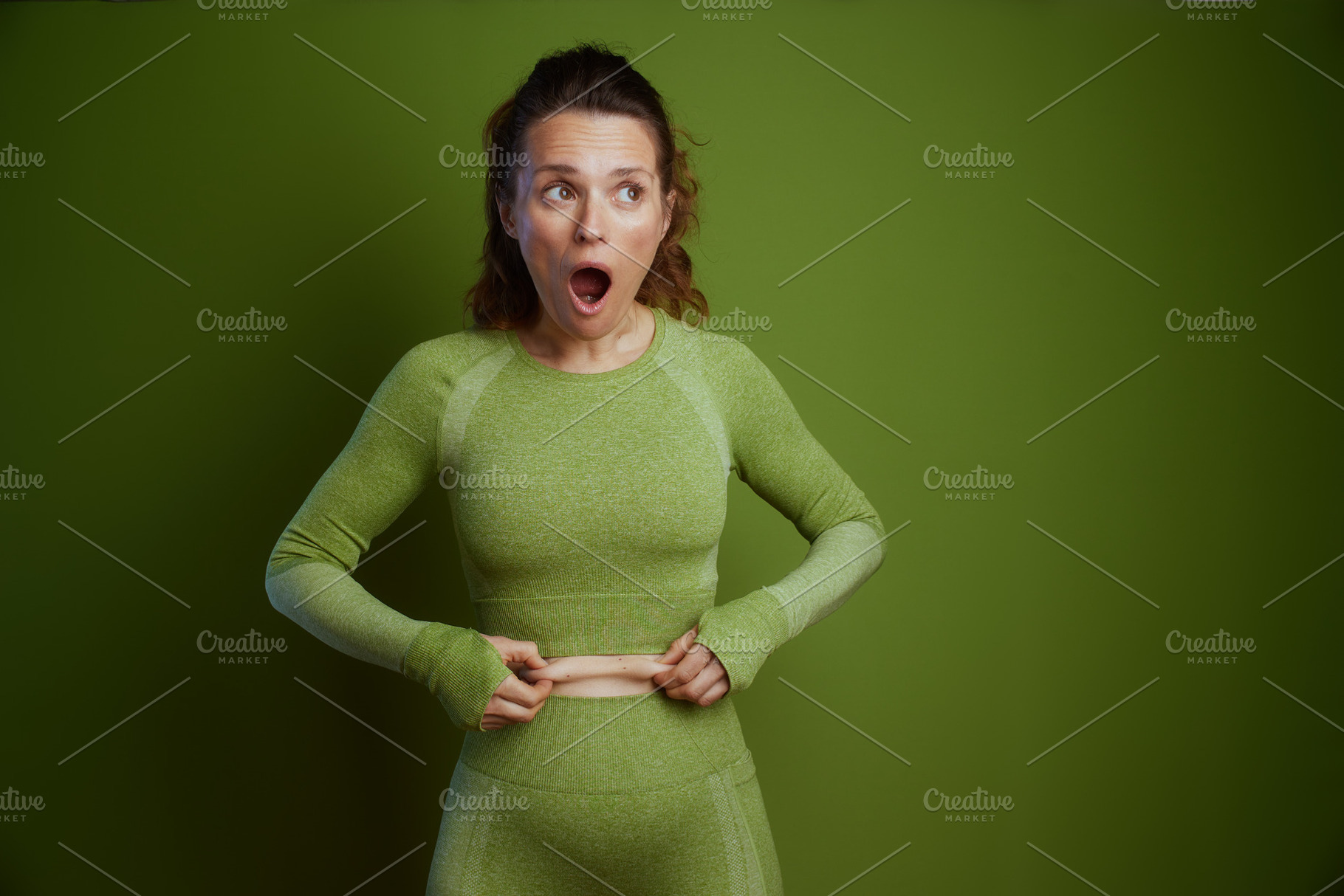 Stomach Pinch: Body Image Surprise, a Person Photo by Alliance Images