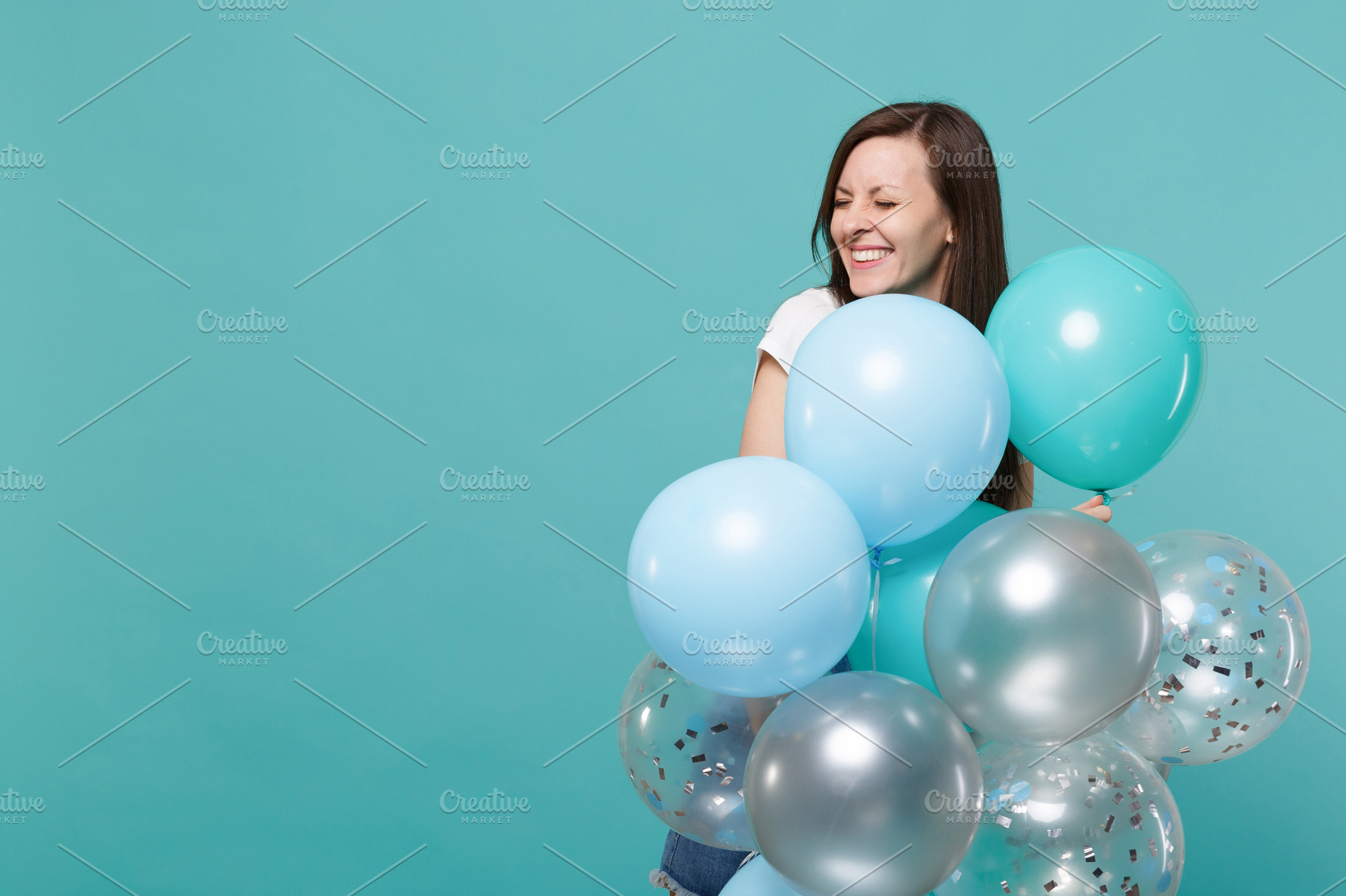 Pretty smiling young woman in denim, a Person Photo by ViDi Studio