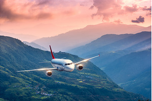 Commercial airplane flying over, a Transportation Photo by den-belitsky