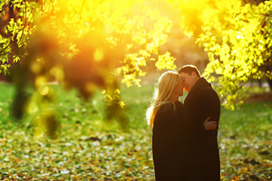 Young couple under the tree