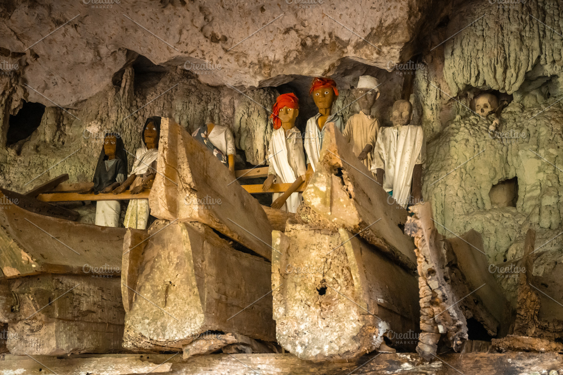 Tau Tau statues in a cave, Toraja, Sulawesi, Indonesia, an Arts & Entertainment Photo by GoodGoods