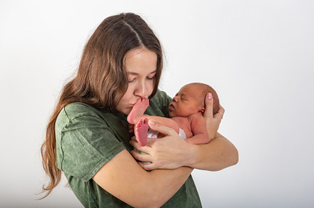 Mother and baby kissing and hugging containing baby, mother, and mom