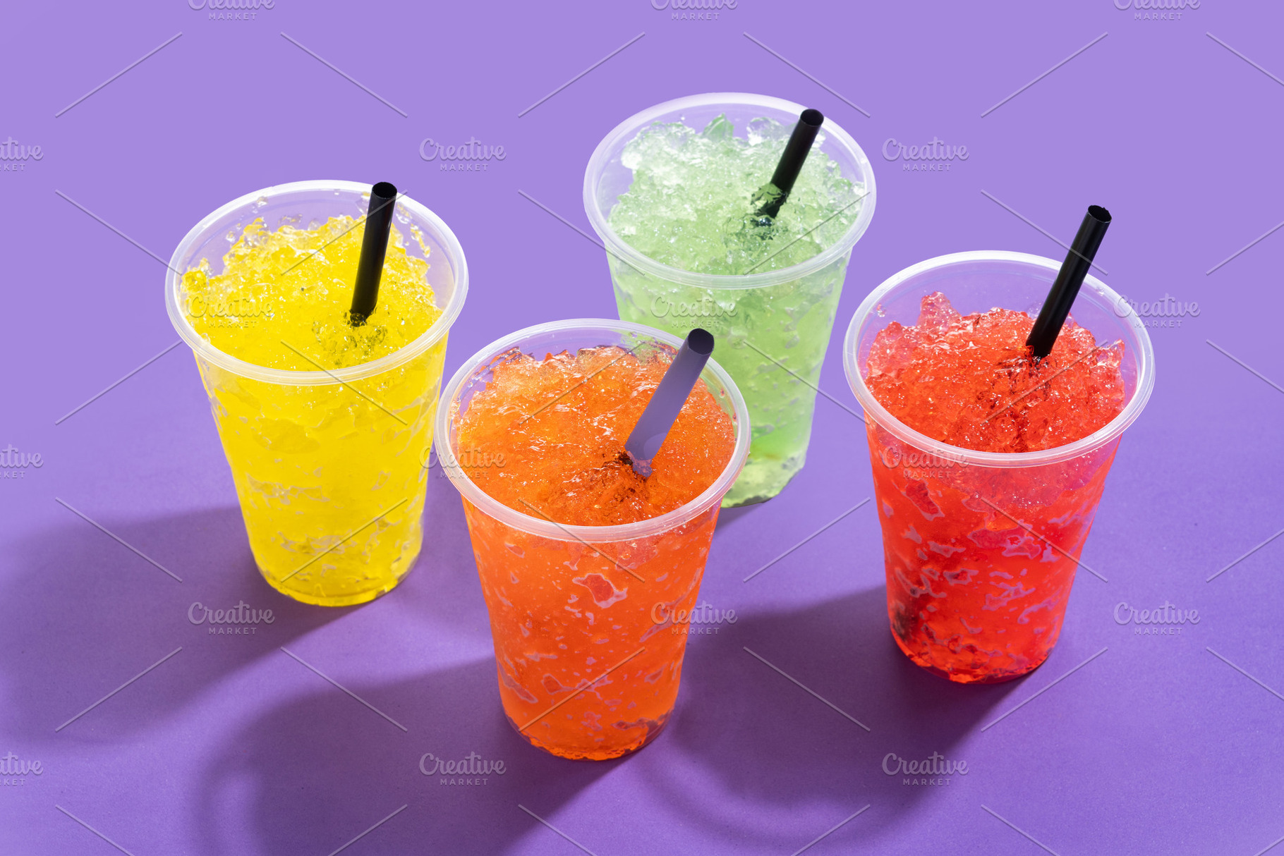 Colorful Frozen Slush Drinks in Plastic Cups, a Food & Drink Photo by etorres69