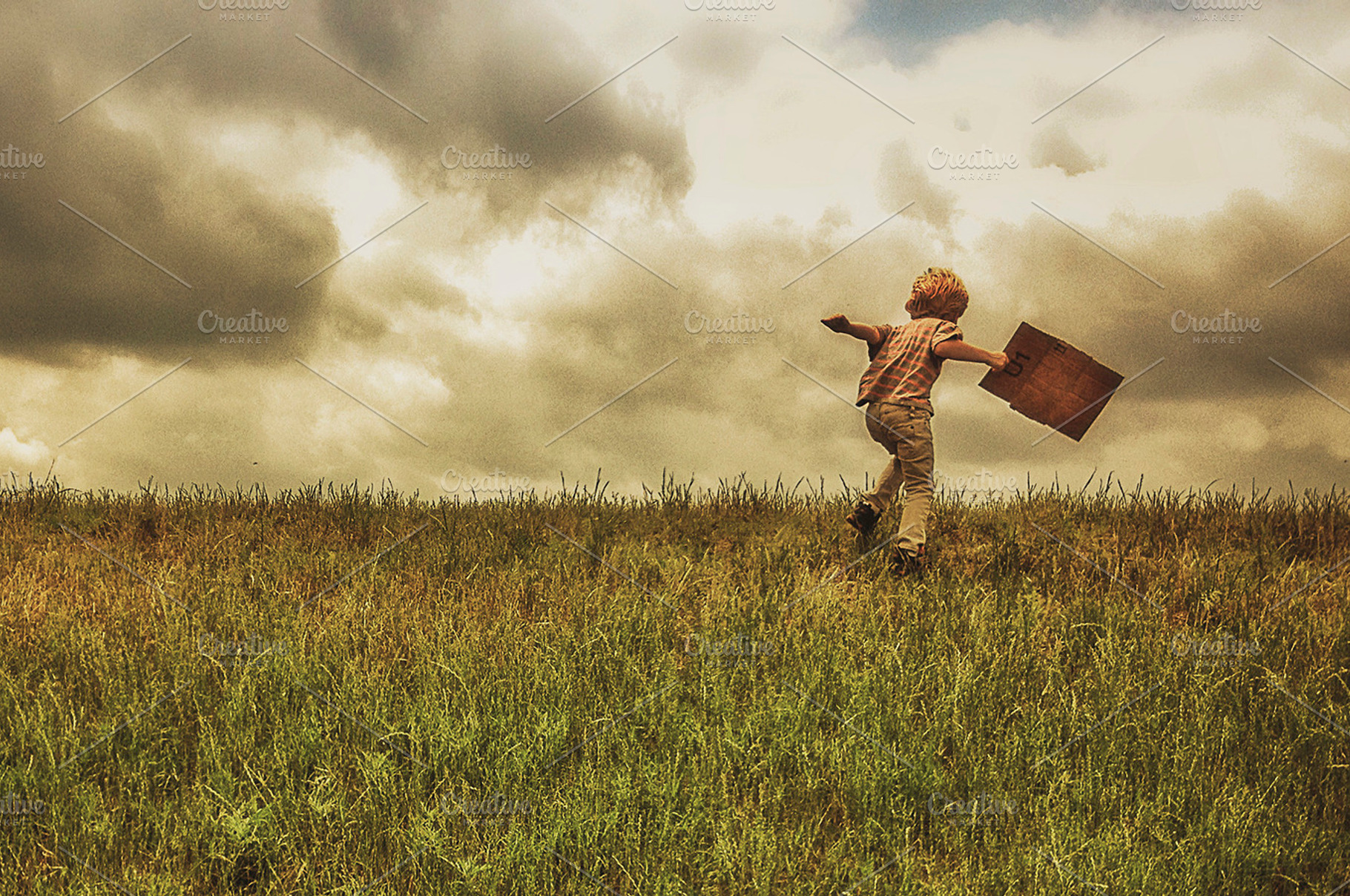 Boy Running Up A Hill