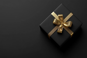 Elegant black gift box with golden r, a Photo by Tanuart