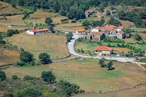 Small mountain village with terracotta rooftops, a Nature Photo by DanFLCreativo