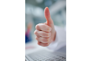 A female doctor giving a thumbs up, a Person Photo by ZinetroN