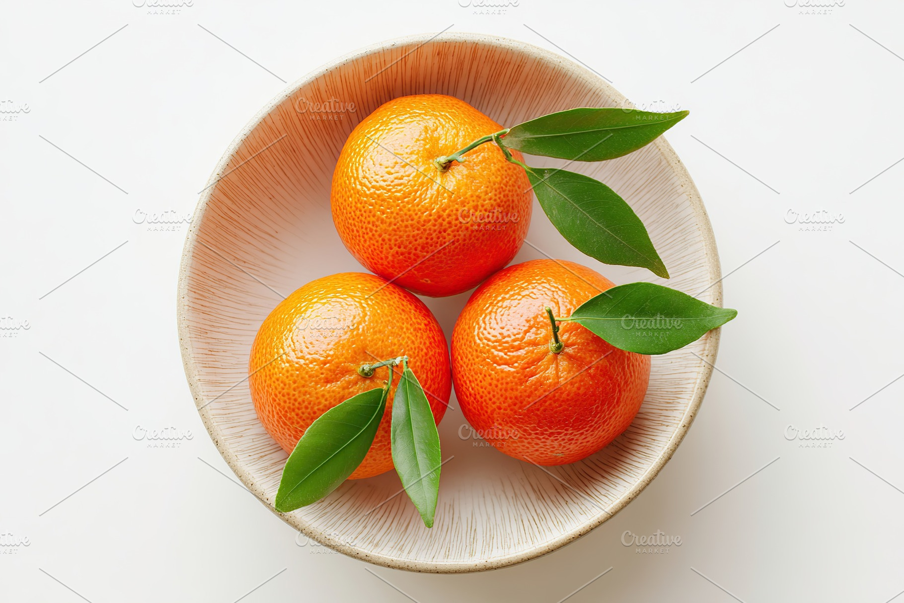 Three fresh mandarins arranged in a deep white bowl with green leaves on a neut, a Food & Drink Photo by AlyaAnd