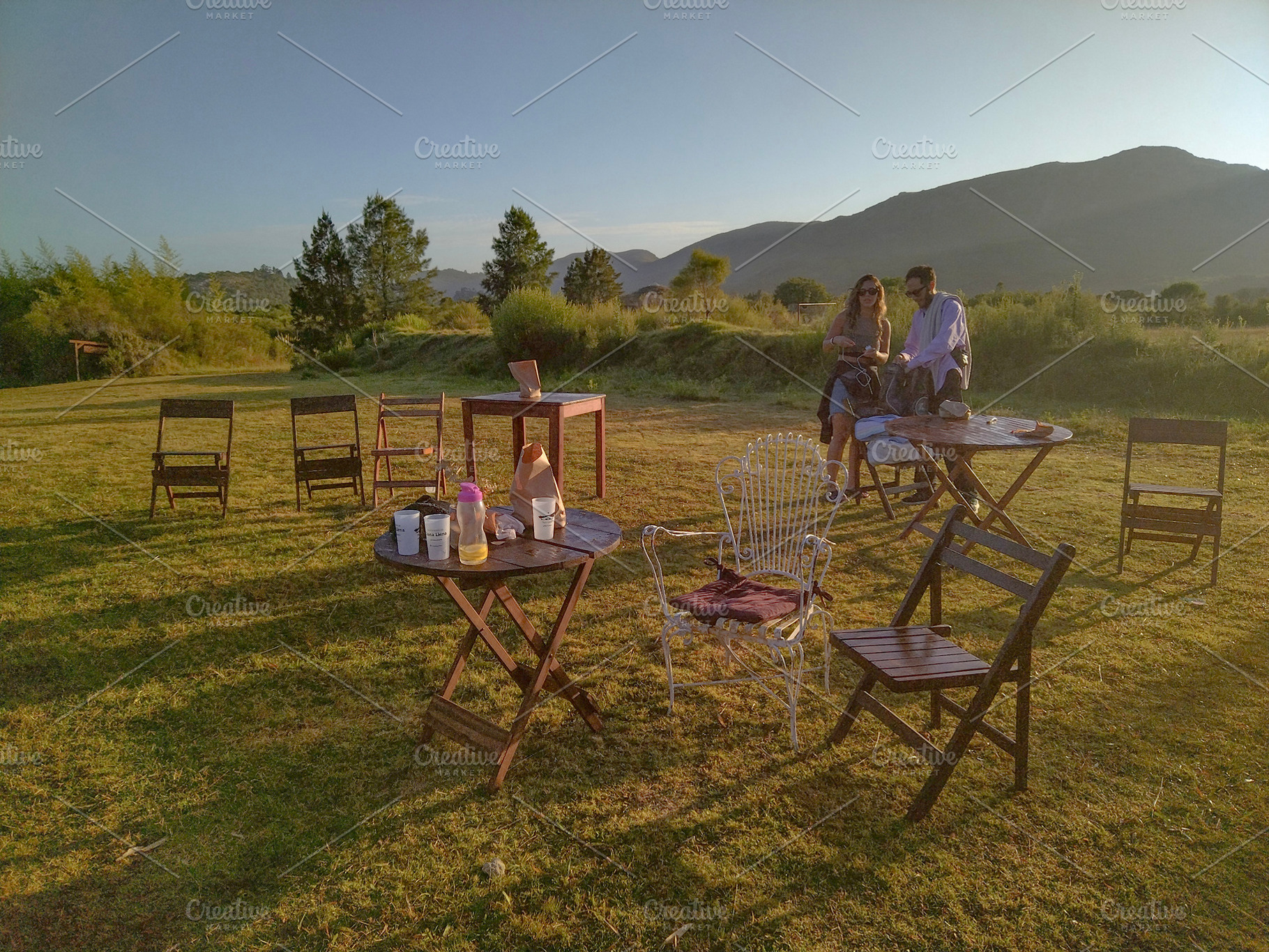 Morning picnic aftermath in open field, a Nature Photo by DanFLCreativo