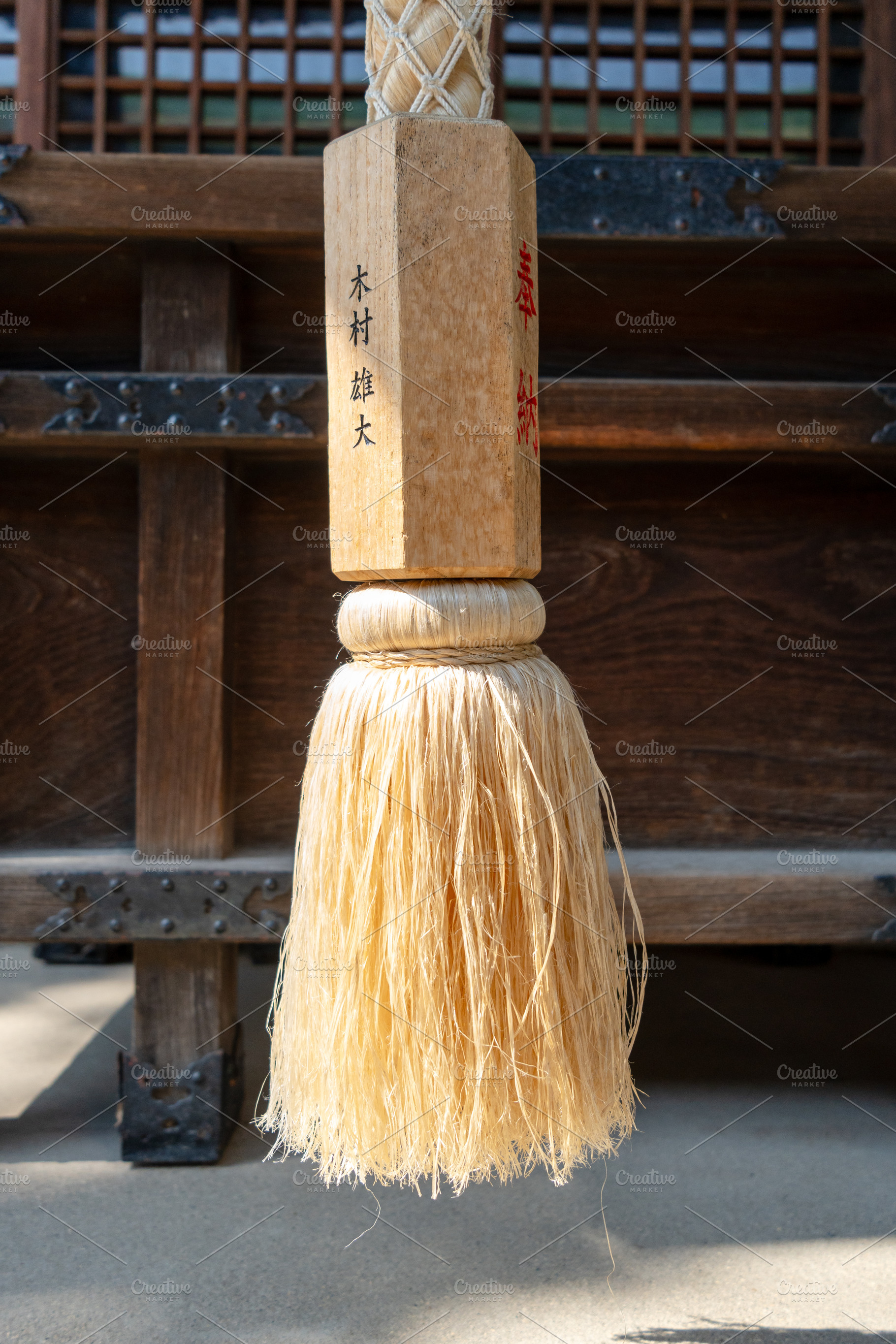 Suzu bell rope at Hokoku Shrine in Osaka, Japan, an Architecture Photo by GoodGoods