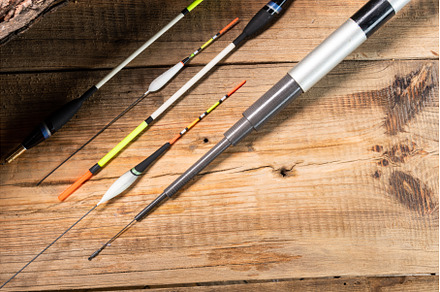 Fishing rod and various floats, a Sports & Recreation Photo by Stockphoto by vzwer
