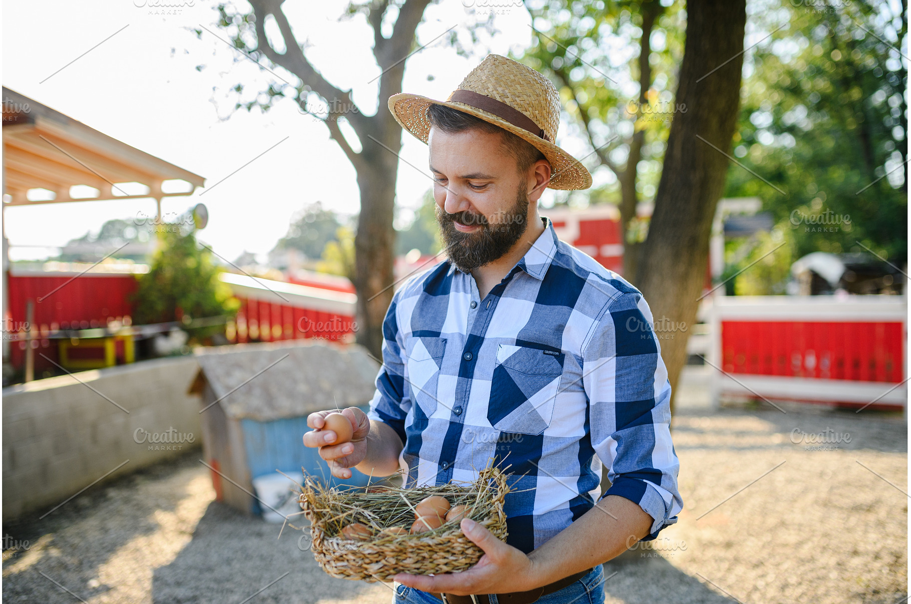 Portrait of farmer holding basket, a Person Photo by HalfPoint