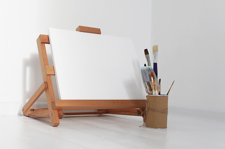 Empty copy space canvas, wood easel, an Arts & Entertainment Photo by Liliia Rudchenko