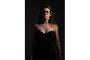 Young woman with glasses wearing a, a Person Photo by volodymyrshtun13795