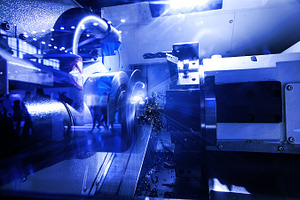 Milling detail on metal cutting machine tool at factory stock photo