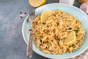 Lemon Orzo Pasta with aromatic herbs and garlic, a Photo by Rimma