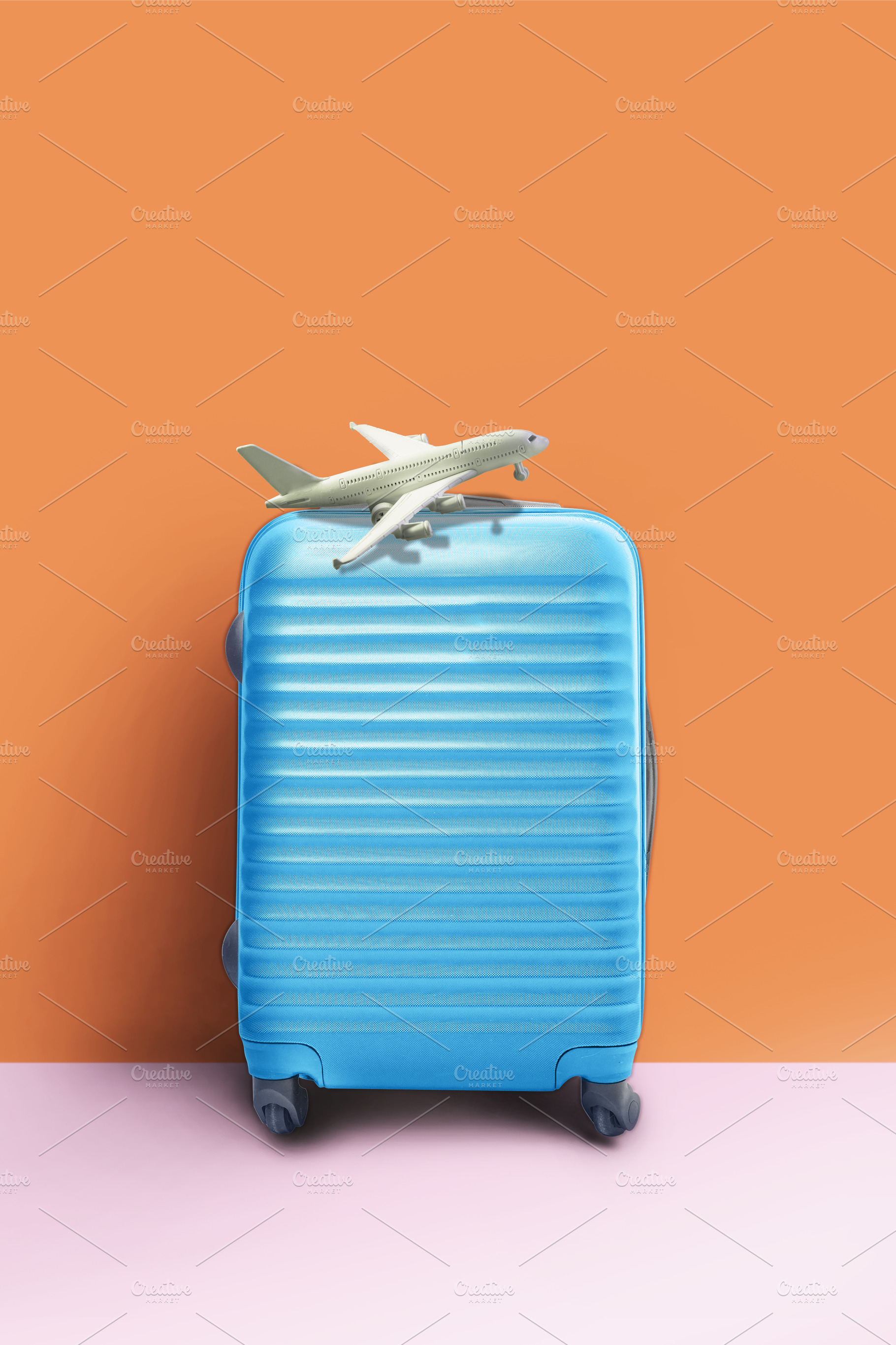 Suitcase and airplane model, minimal, a Holiday Photo by SZ IMAGE