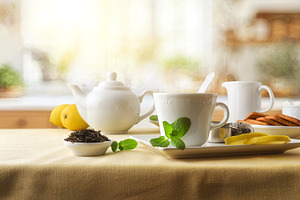 Breakfast with green tea on a kitchen table with tablecloth, a Food & Drink Photo by Davizro's Market