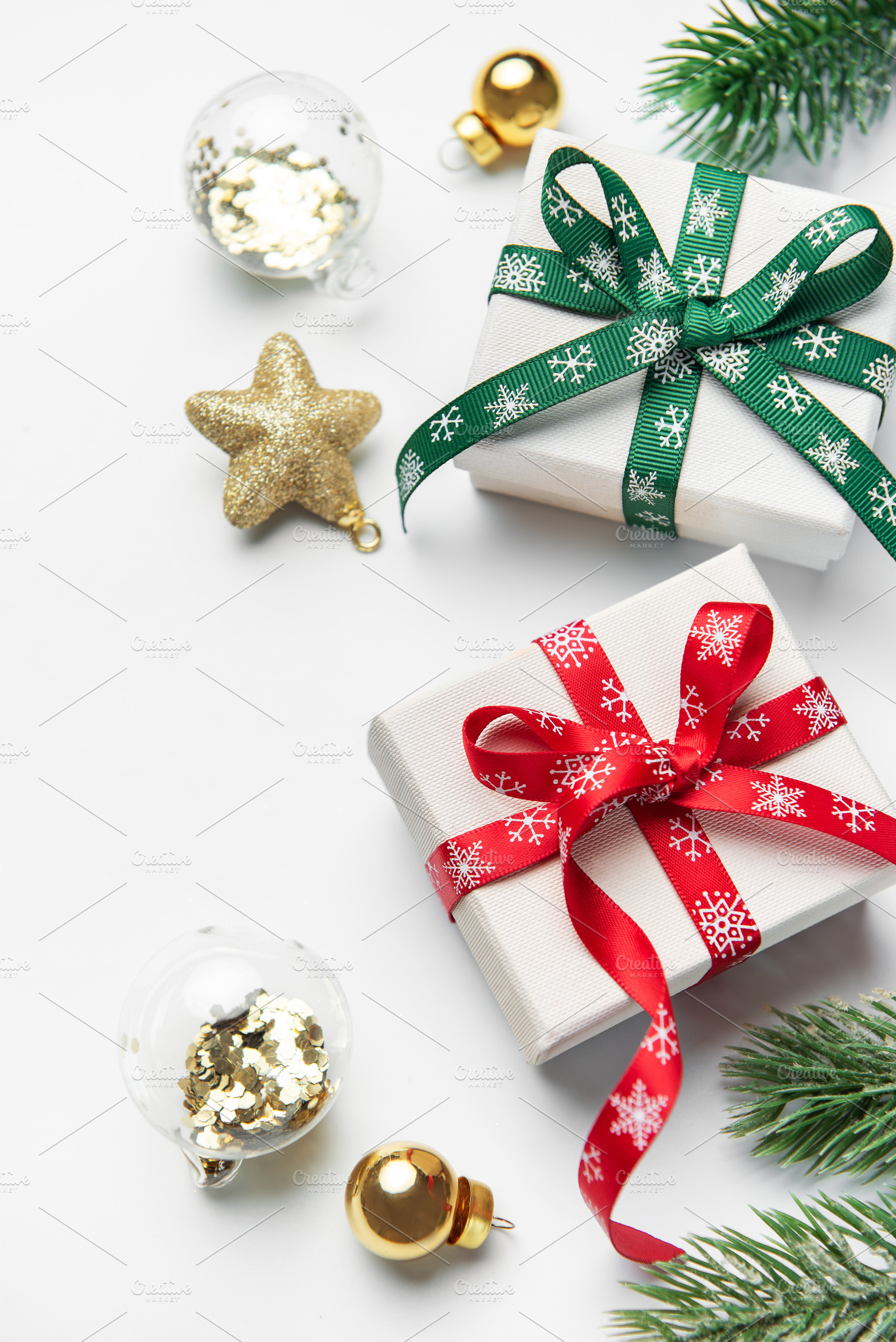 Christmas gifts decorations and fir branches creating holiday bo, a Holiday Photo by Olena Rudo