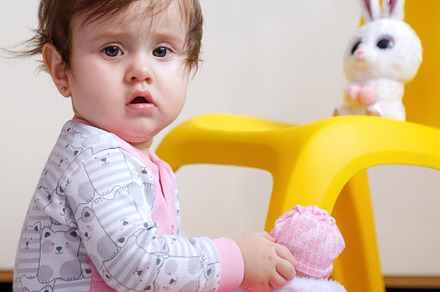 10 months old baby girl playing with toys. Portrait of a cute little girl, a Person Photo by Rohan Photography