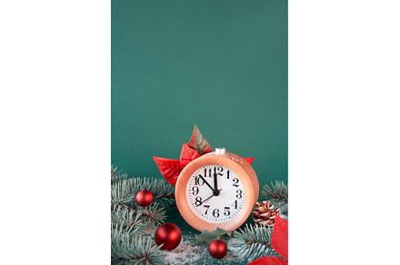 Alarm clock with poinsettia, fir, a Holiday Photo by tilialucida