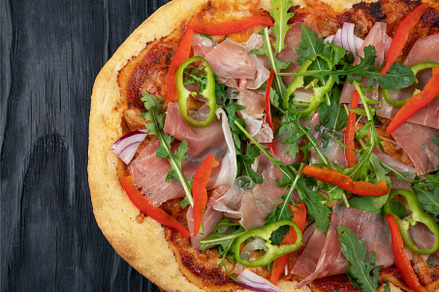 Italian Pizza on plate with jamon, a Food & Drink Photo by Jan Jack Russo Media