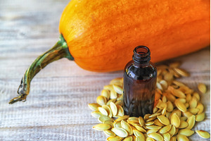 Pumpkin seed oil in a bottle, a Food & Drink Photo by yanadjana