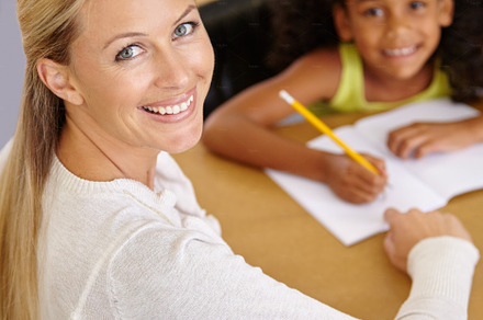 Teaching is her calling, a Photo by Peopleimages.com