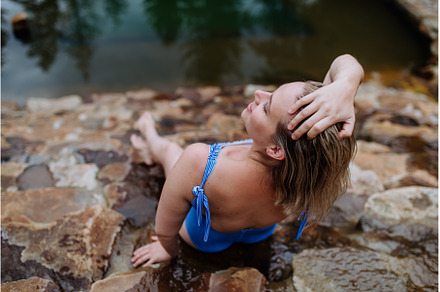 Rear view of happy young woman, a Sports & Recreation Photo by HalfPoint