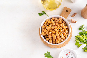 Bowl with cooked boiled chickpeas, a Food & Drink Photo by Rimma
