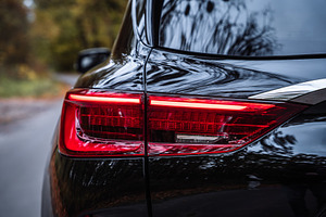 Rear Car Taillight with Red LED Light on Road, a Transportation Photo by Red Hot Chili Pepper Shop