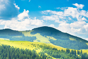 Green sunny valley in mountains, a Nature Photo by Vapi