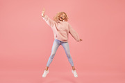Expressing joy and happiness. Full length shot of active young woman jumping an, a Photo by Prostock-Studio (Thumbnail 2 of 2)