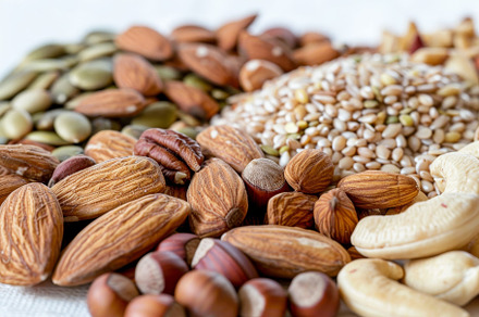 Various nuts and seeds spread on a t, a Photo by Iftikhar Alam