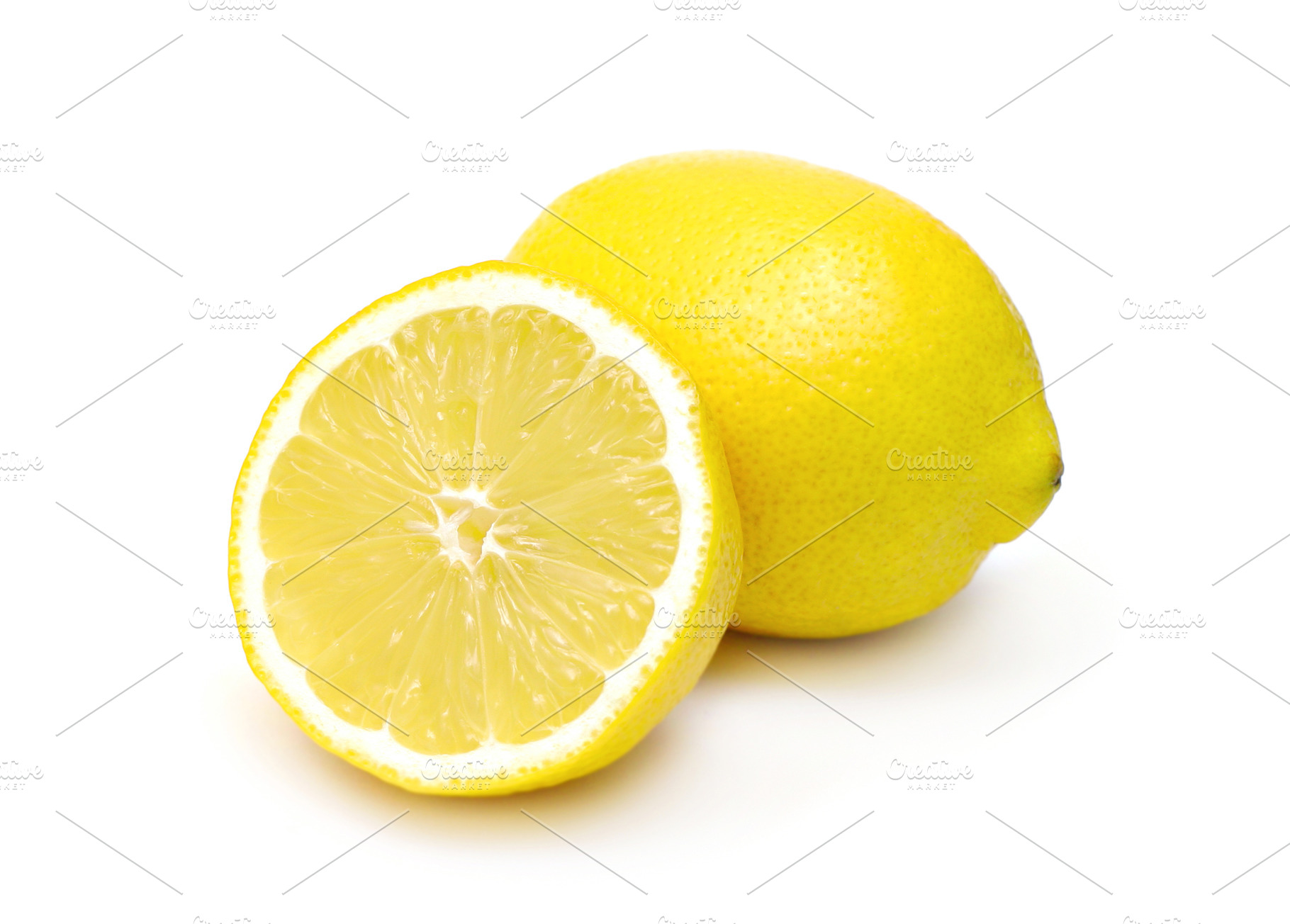 Two lemons isolated, a Photo by saiko3p