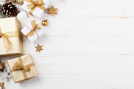 Christmas gift boxes on white wooden background, a Holiday Photo by AlyaAnd