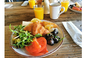 Croissant, tomato, mushrooms, greens, a Food & Drink Photo by sceptical cactus