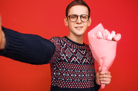 A man in glasses, with a bouquet of, a Person Photo by Shopping King Louie