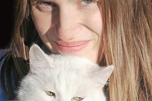 Young woman with cat, a Photo by saiko3p