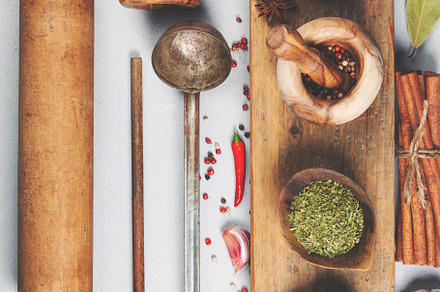 Cooking background with herbs, spices and rustic kitchen utensils, top view, a Food & Drink Photo by Natalia Klenova's Shop