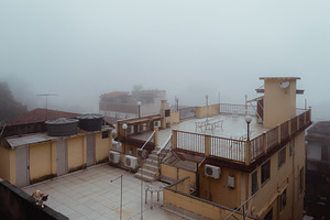 Foggy urban rooftop view, an Architecture Photo by SkyNext