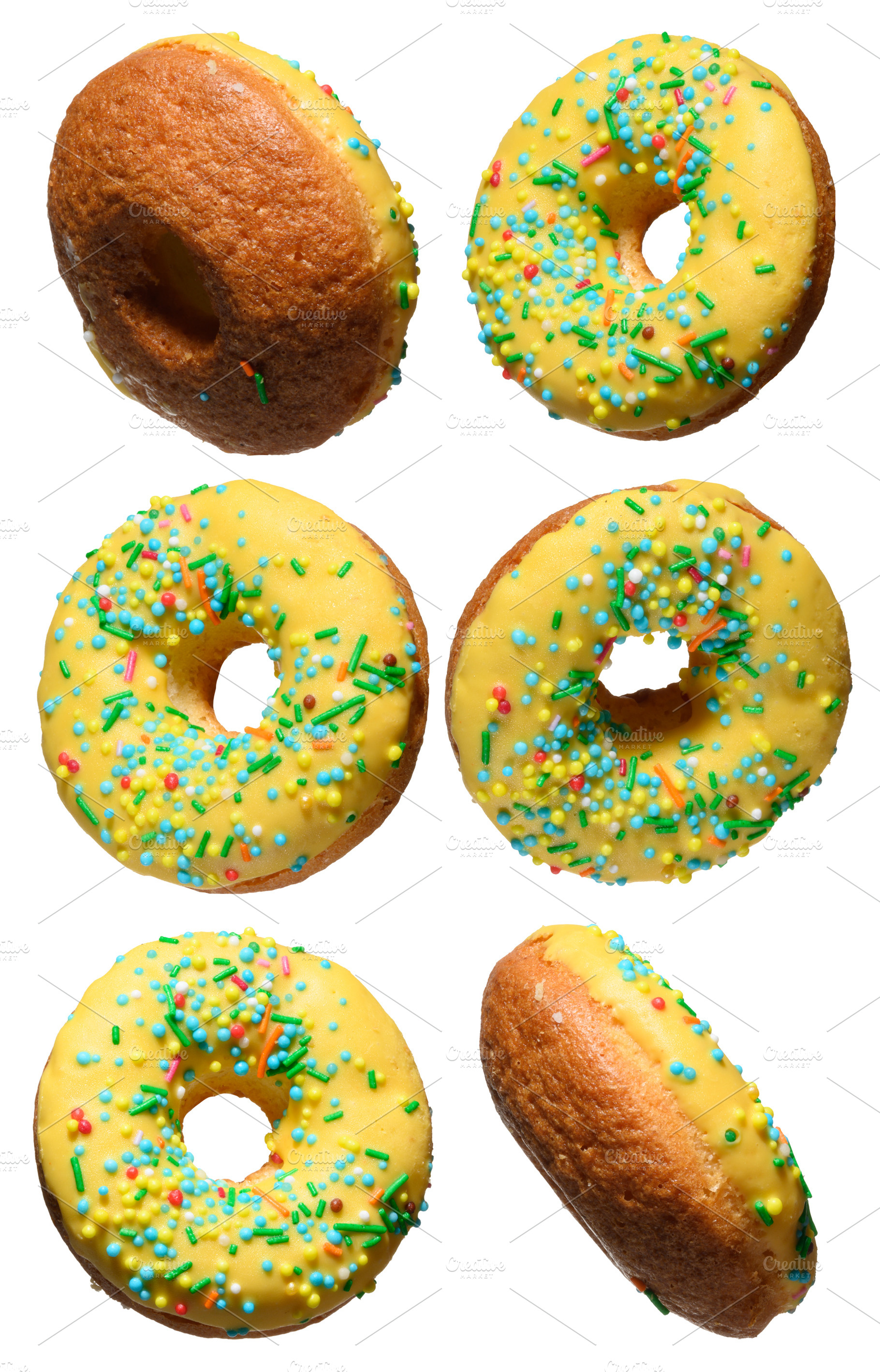 Yellow glazed donuts, each decorated with multi colored sprinkle, a Food & Drink Photo by ndanko