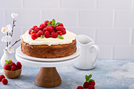 Simple summer cake with raspberries and frosting, a Food & Drink Photo by farwasser