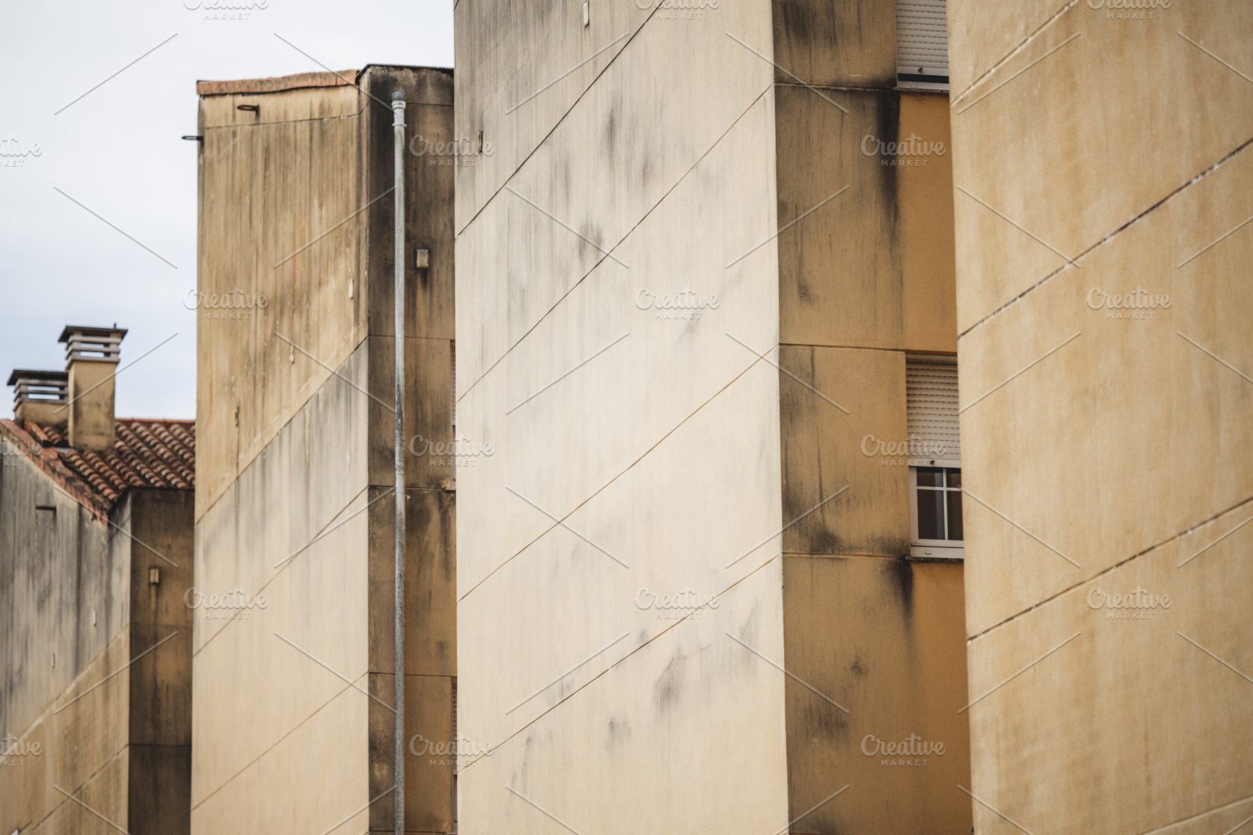 Yellow apartment facades close-up, an Architecture Photo by SkyNext